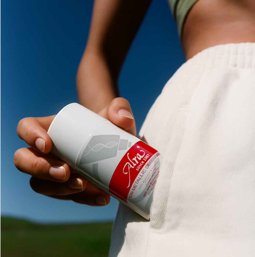 Holding Alra non-metallic deodorant in pocket