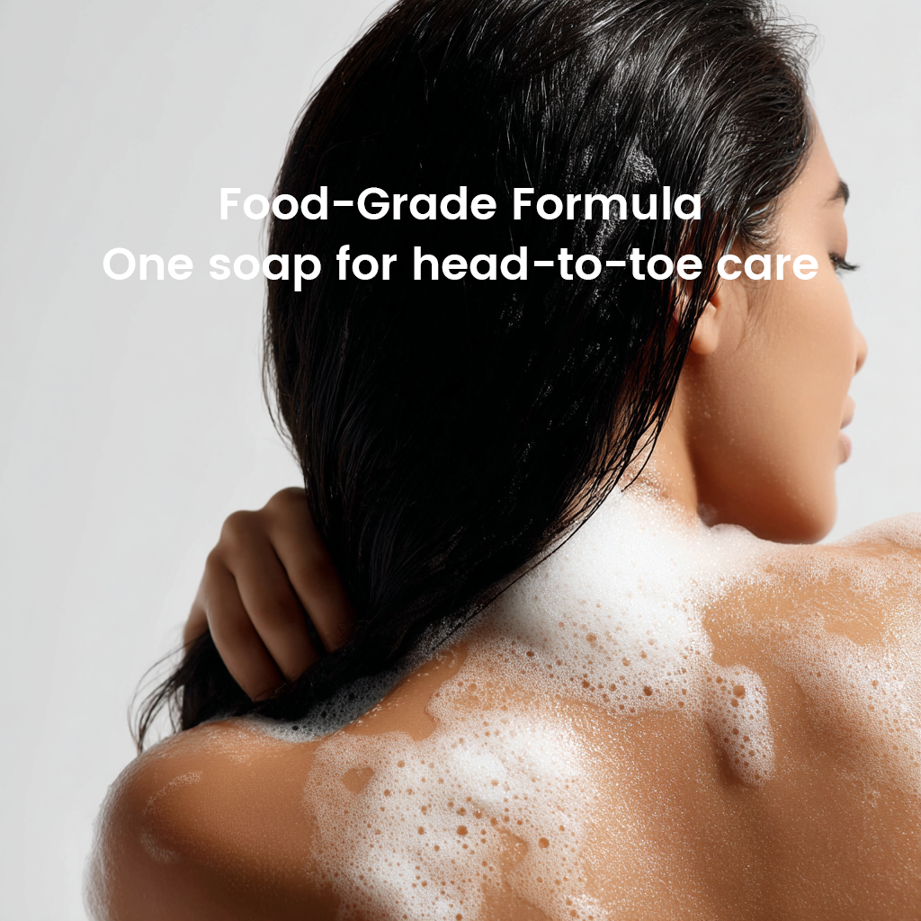 Woman using Alra soap for head-to-toe cleansing, showing lather on back
